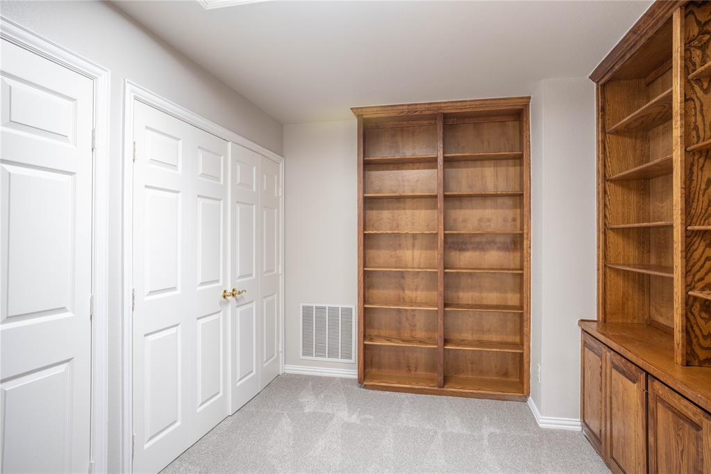 250 Timberleaf Drive Double Oak, TX 75077 - Photo 16 of 23 a view of a room with walk in closet and empty room