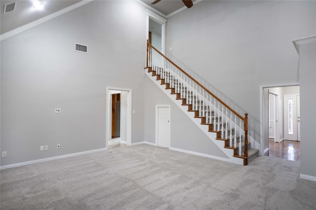250 Timberleaf Drive Double Oak, TX 75077 - Photo 5 of 23 a view of an entryway with stairs
