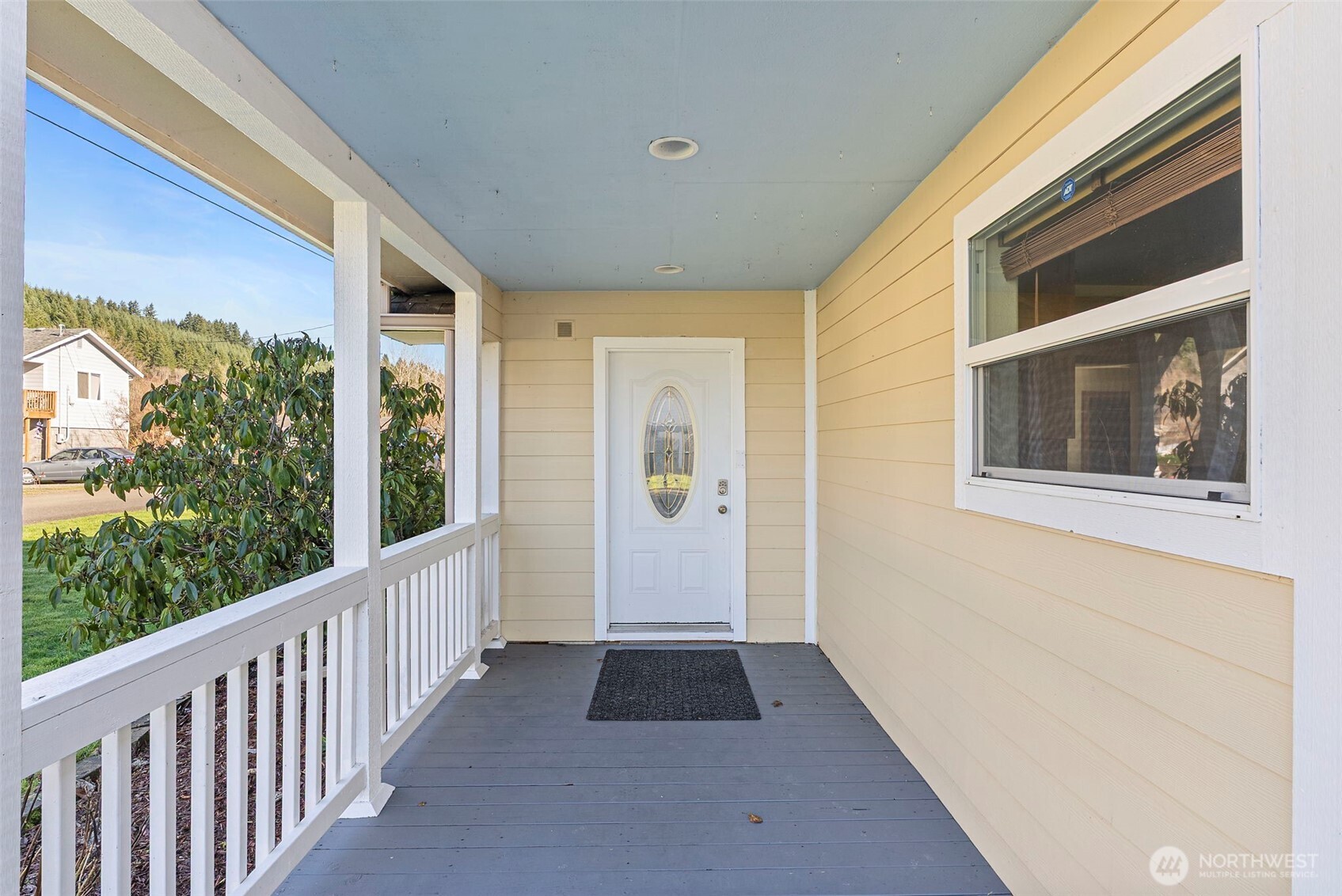 802 State Street Centralia, WA 98531 - Photo 2 of 40 a view of a porch with wooden floor and stairs