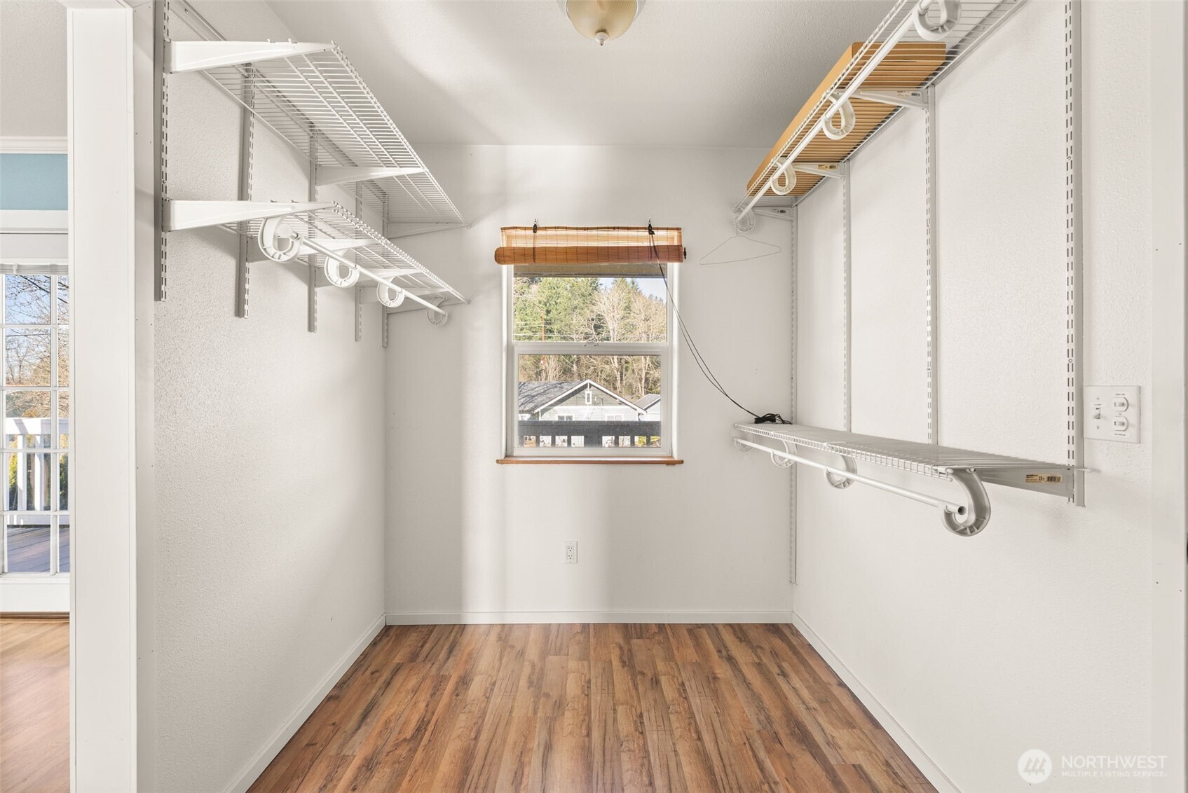 802 State Street Centralia, WA 98531 - Photo 22 of 40 a view of a room with wooden floor closet and windows