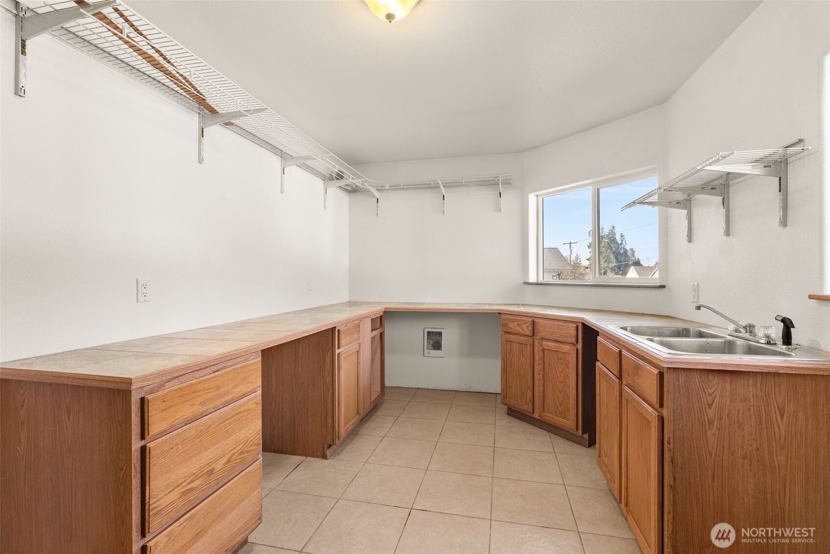 802 State Street Centralia, WA 98531 - Photo 23 of 40 a kitchen with a sink cabinets and window