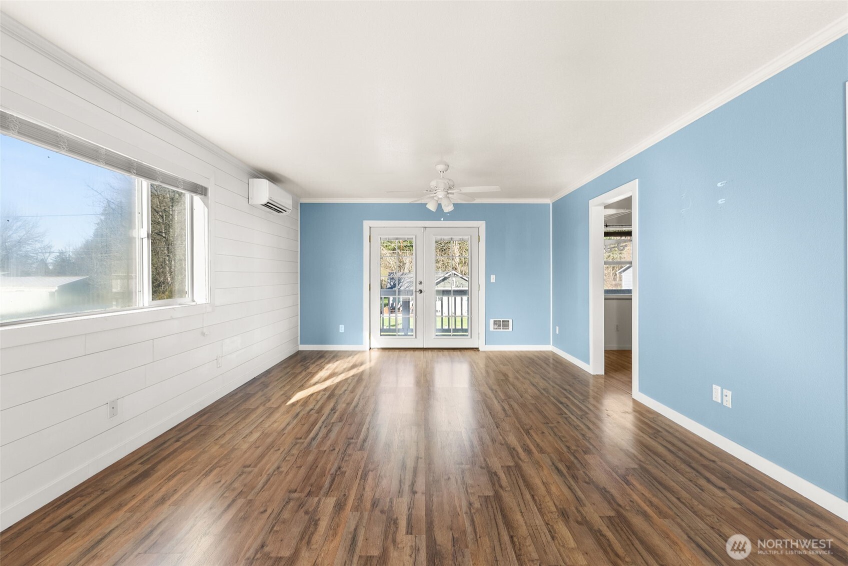 802 State Street Centralia, WA 98531 - Photo 24 of 40 a view of an empty room with wooden floor and a window
