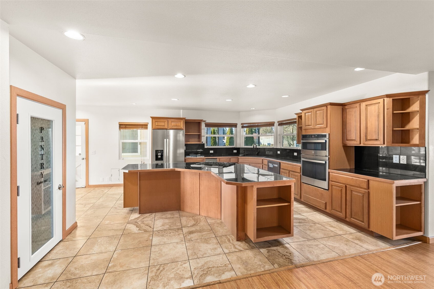 802 State Street Centralia, WA 98531 - Photo 6 of 40 a kitchen with stainless steel appliances granite countertop a stove and a refrigerator