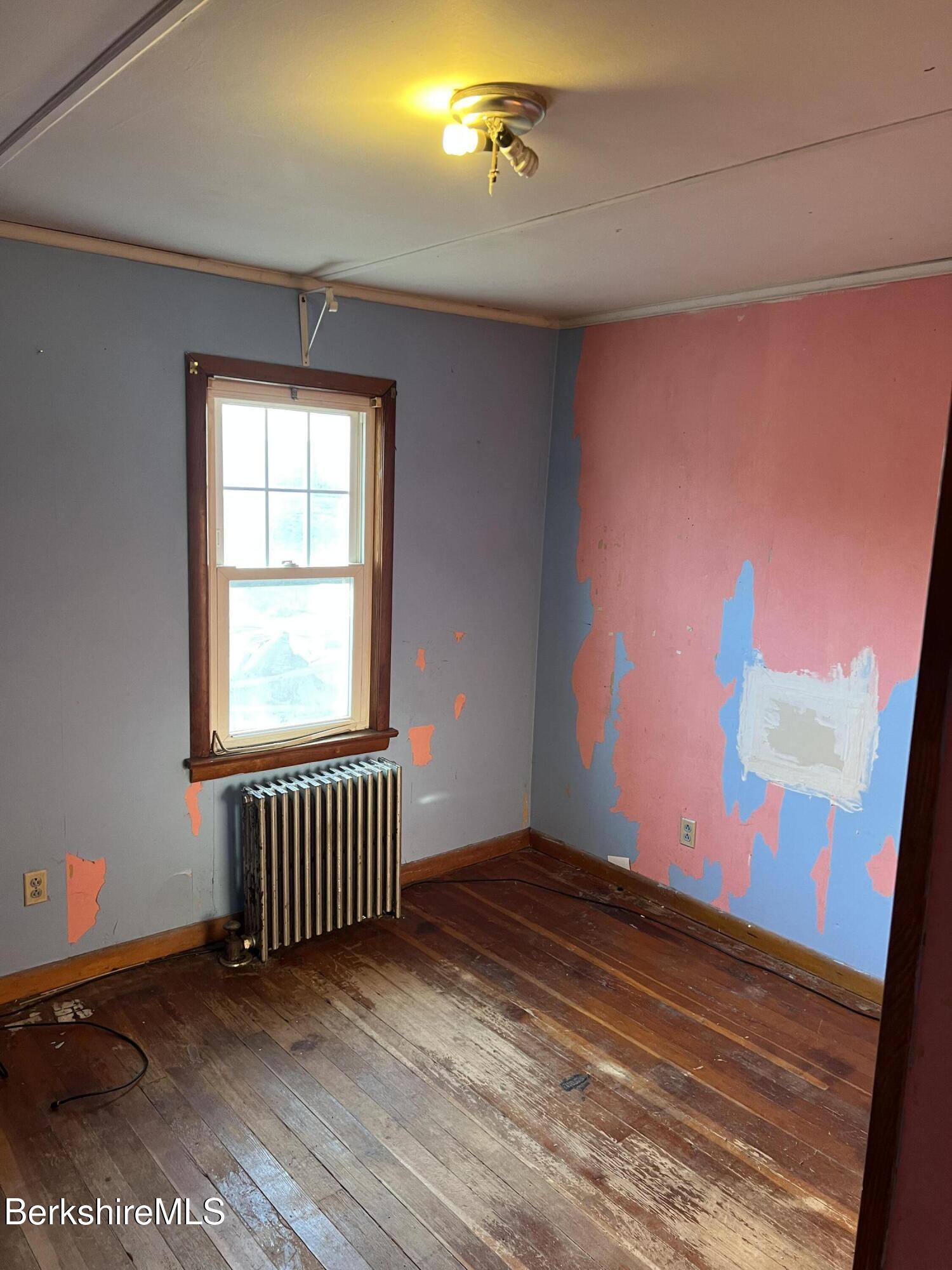 41 Willow Street Adams, MA 01220 - Photo 11 of 25 a view of empty room with wooden floor