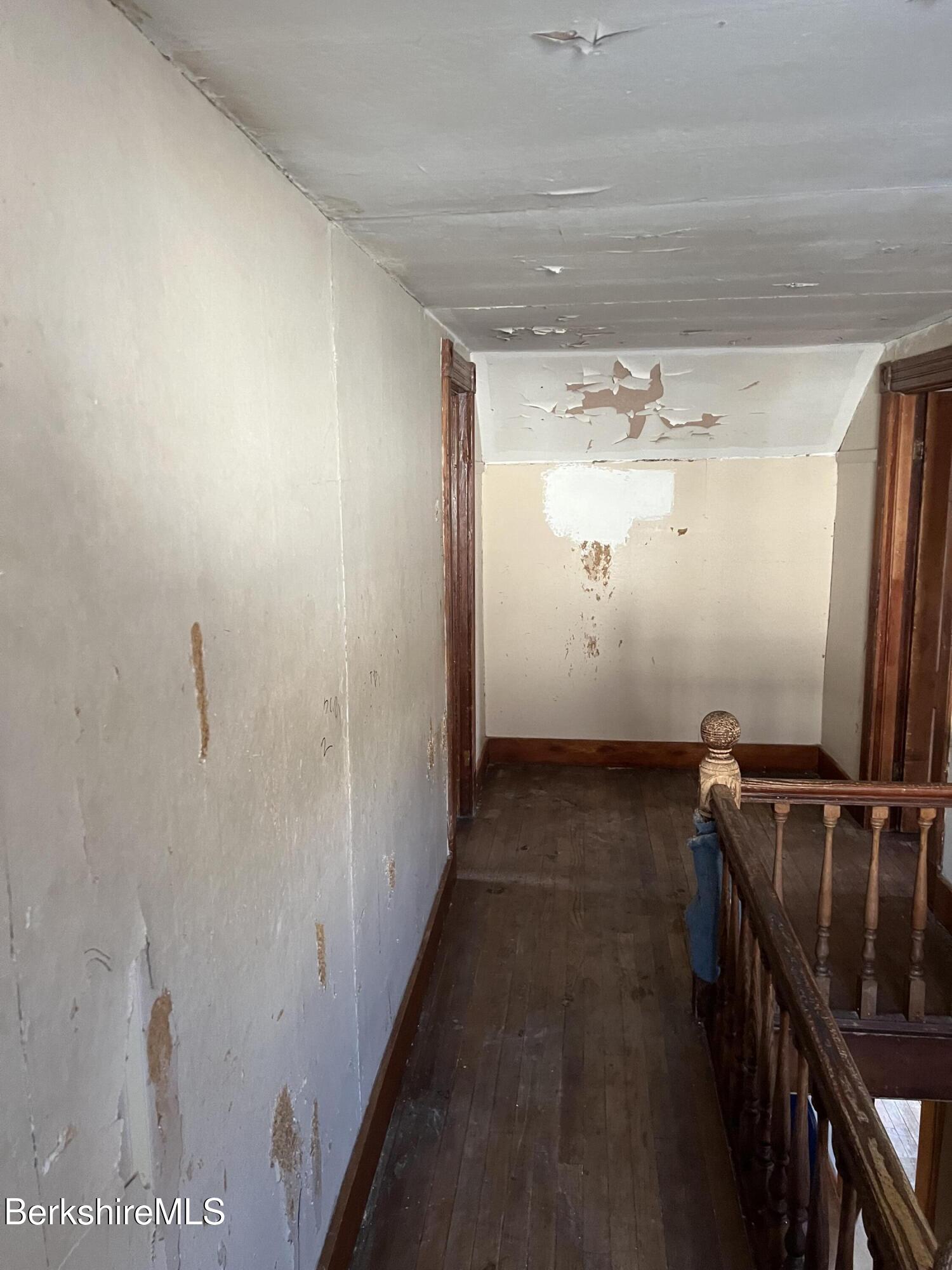 41 Willow Street Adams, MA 01220 - Photo 14 of 25 a view of a hallway with wooden floor