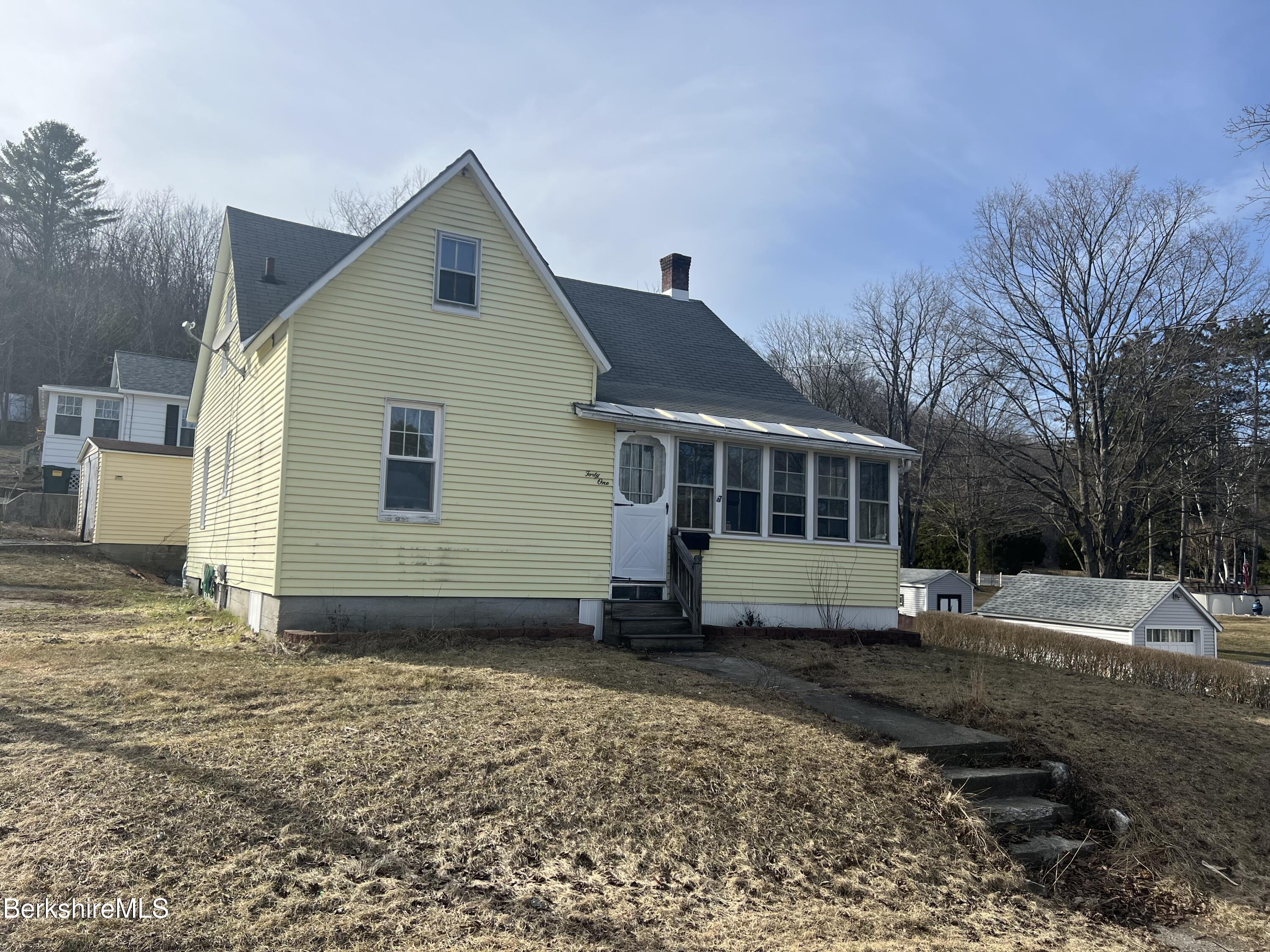 41 Willow Street Adams, MA 01220 - Photo 2 of 25 a view of a house with a yard