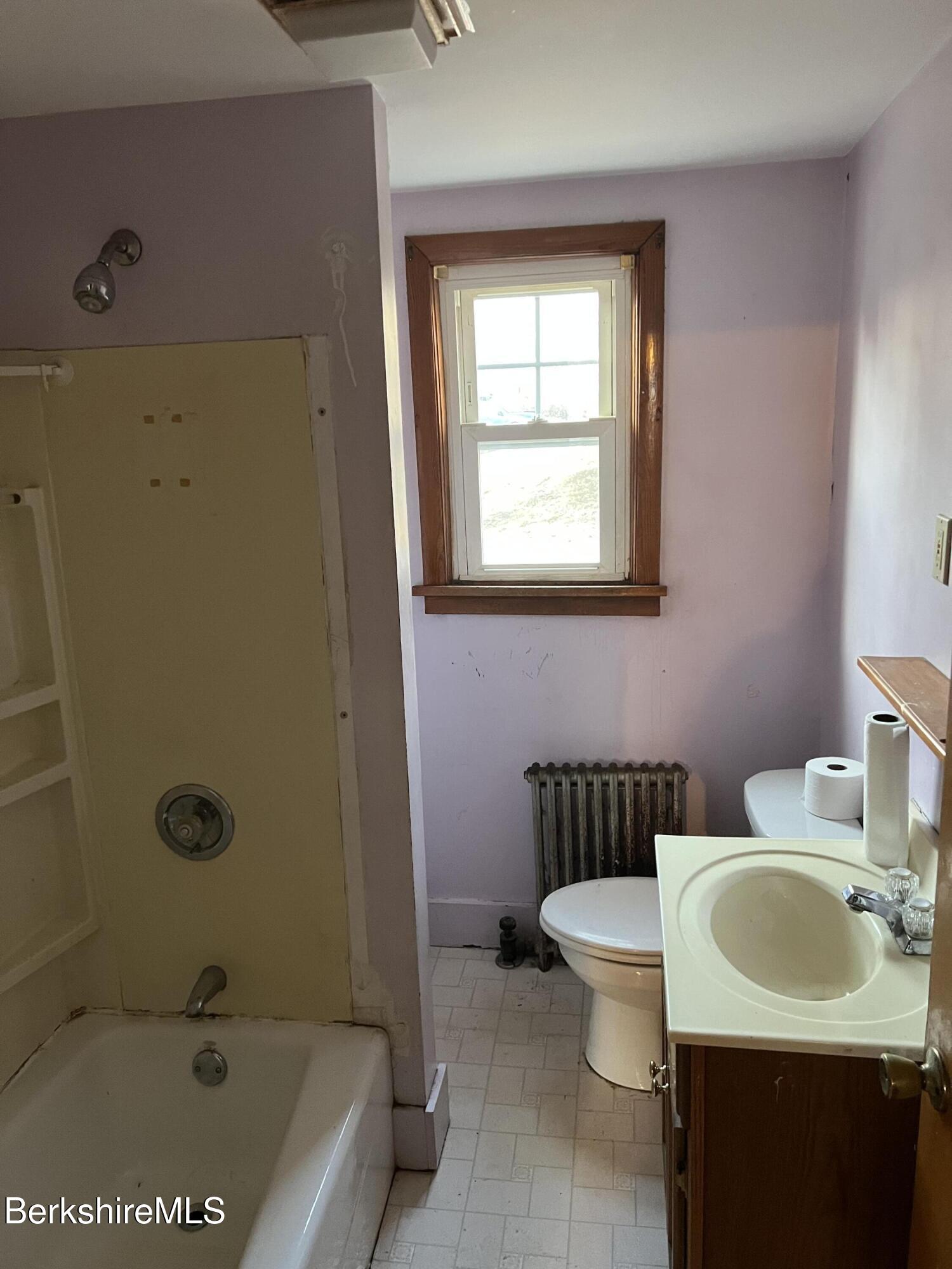 41 Willow Street Adams, MA 01220 - Photo 8 of 25 a bathroom with a sink toilet and shower