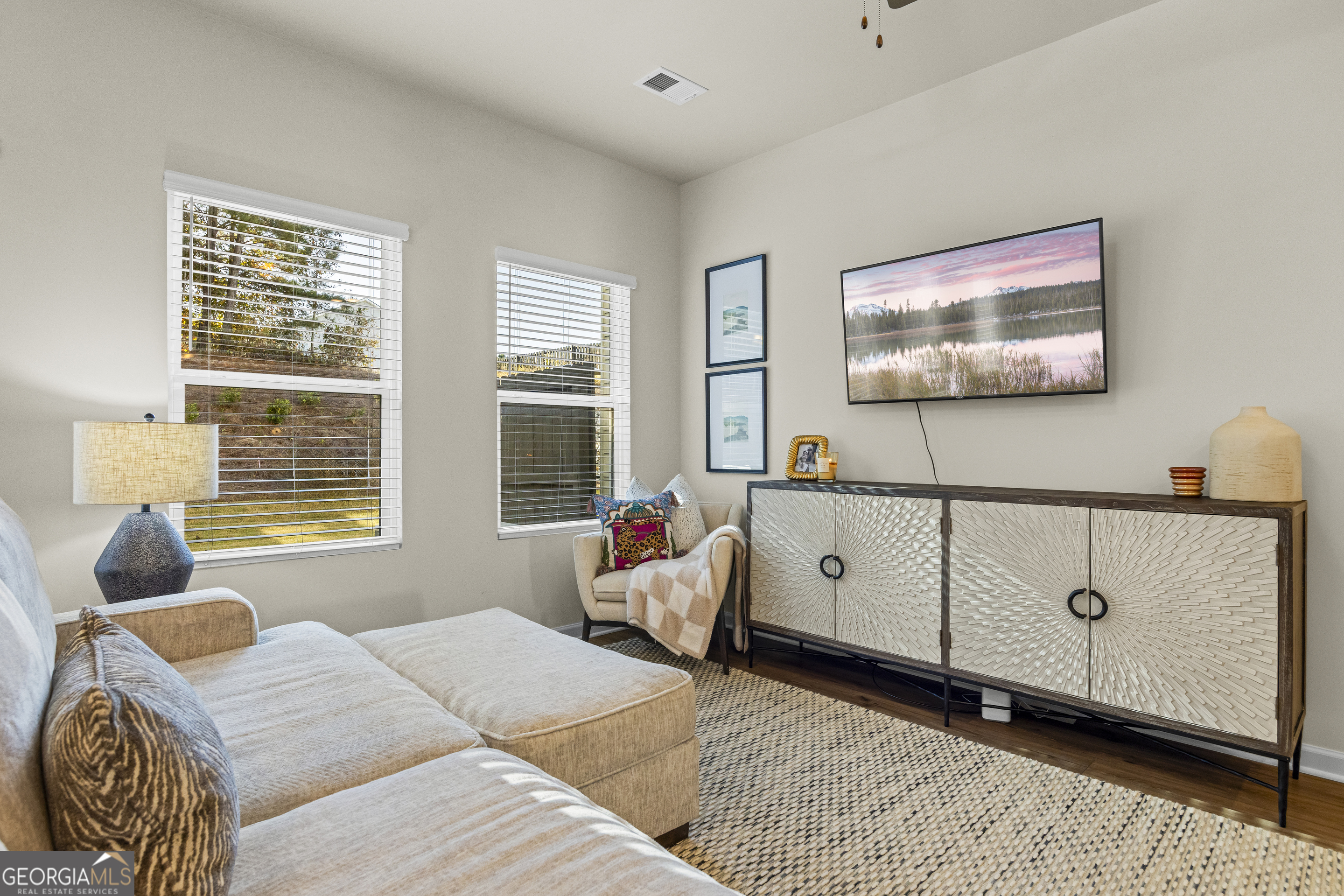 550 Buxton Road Hoschton, GA 30548 - Photo 25 of 57 a bedroom with furniture and window