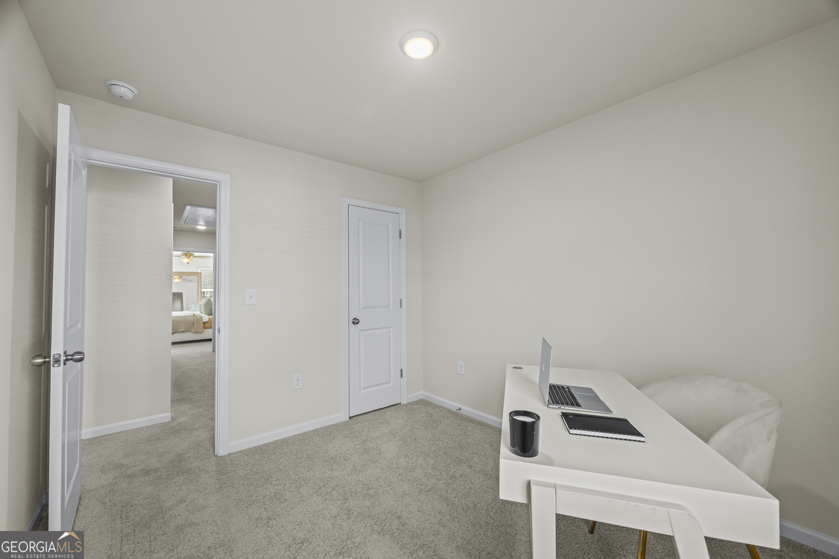 550 Buxton Road Hoschton, GA 30548 - Photo 30 of 57 a room with a bench