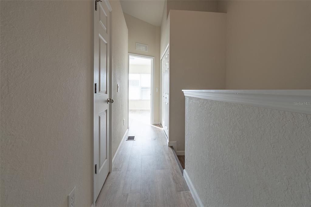 4900 Southwest 45th Street Ocala, FL 34474 - Photo 30 of 44 a view of a room with wooden floor