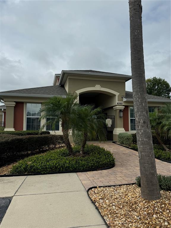 4900 Southwest 45th Street Ocala, FL 34474 - Photo 6 of 44 a front view of house with a garden