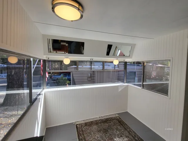 a kitchen with a stove and a refrigerator