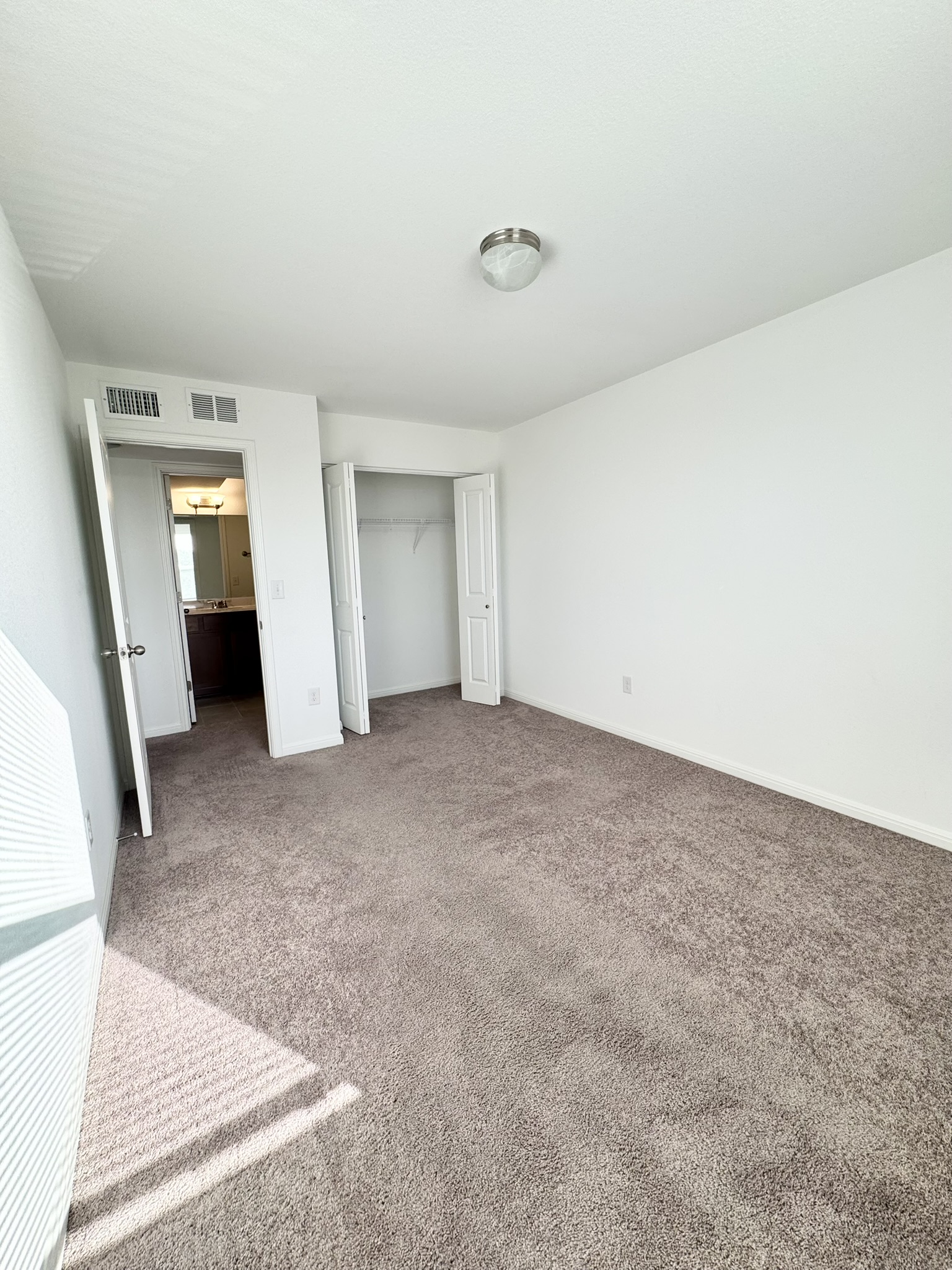211 Martha Lane Kyle, TX 78640 - Photo 17 of 32 an empty room with a fireplace