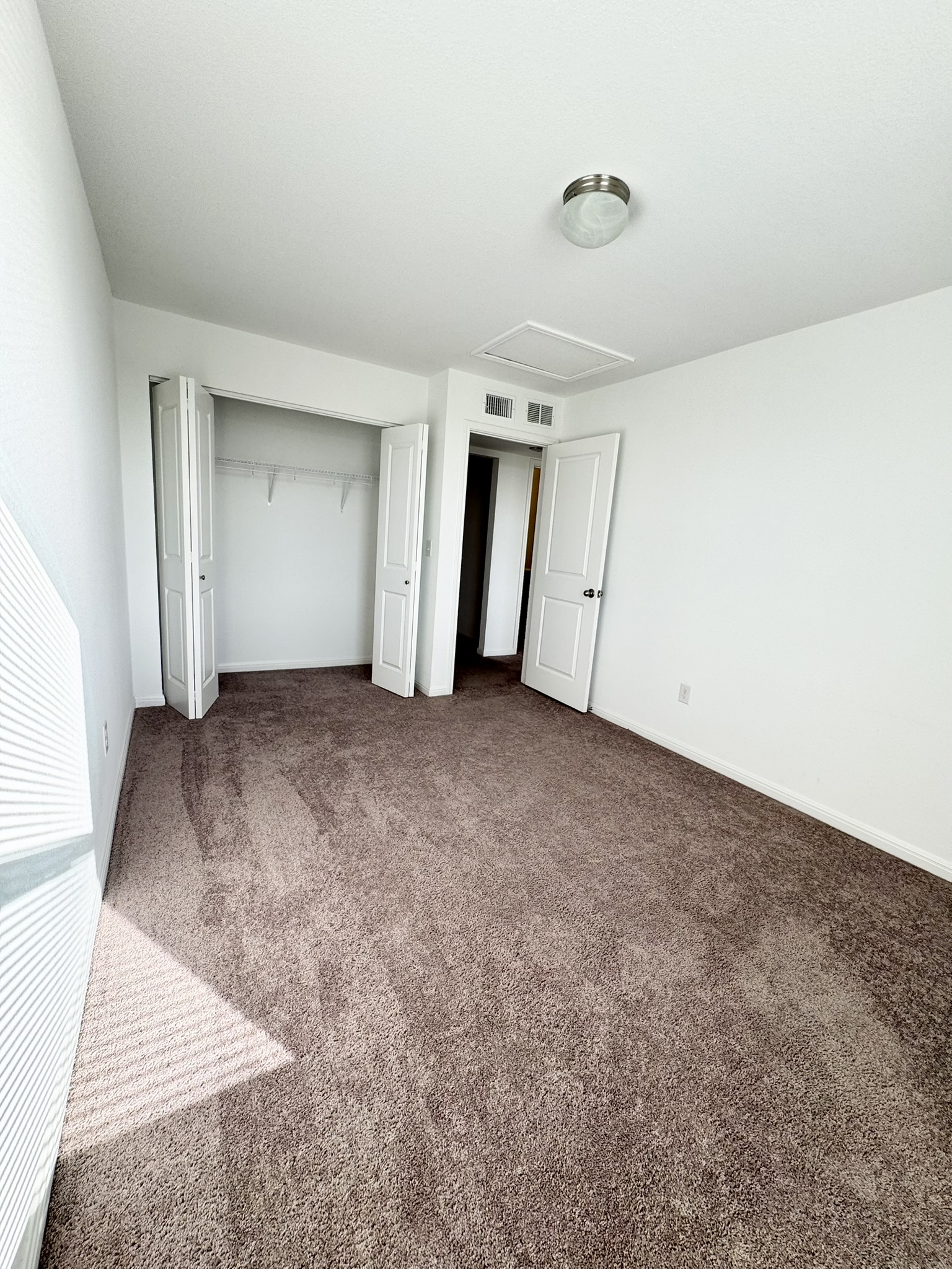 211 Martha Lane Kyle, TX 78640 - Photo 19 of 32 an empty room with a natural light