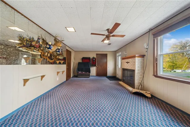 a view of a hallway with a kitchen
