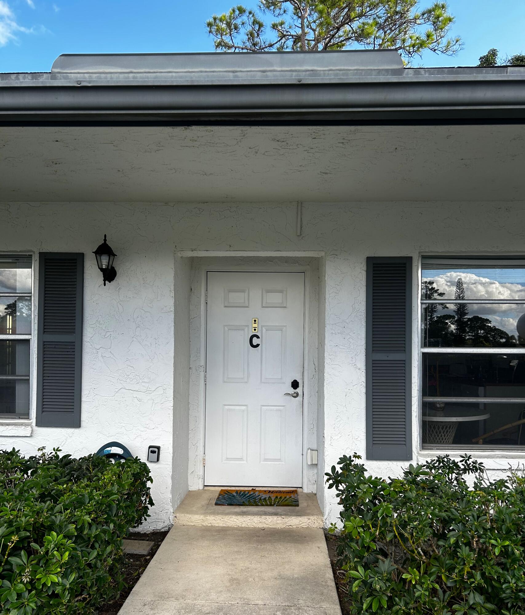 5200 Privet Place, Unit C Delray Beach, FL 33484 - Photo 26 of 27 BRIDGEVIEW FRONT ENTRANCE - Copy