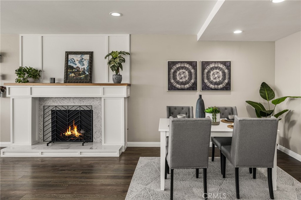 688 Buttonwood Drive Brea, CA 92821 - Photo 16 of 54 a dining room with furniture and a fireplace