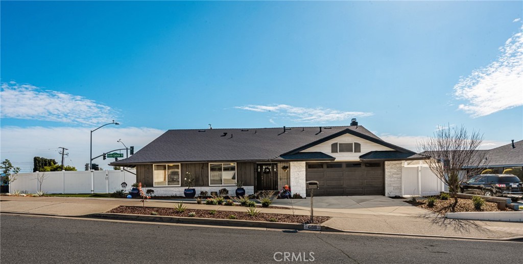 688 Buttonwood Drive Brea, CA 92821 - Photo 2 of 54 a front view of a house with a yard