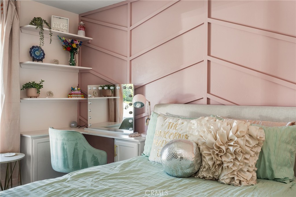 688 Buttonwood Drive Brea, CA 92821 - Photo 35 of 54 a bedroom with a bed and a chair