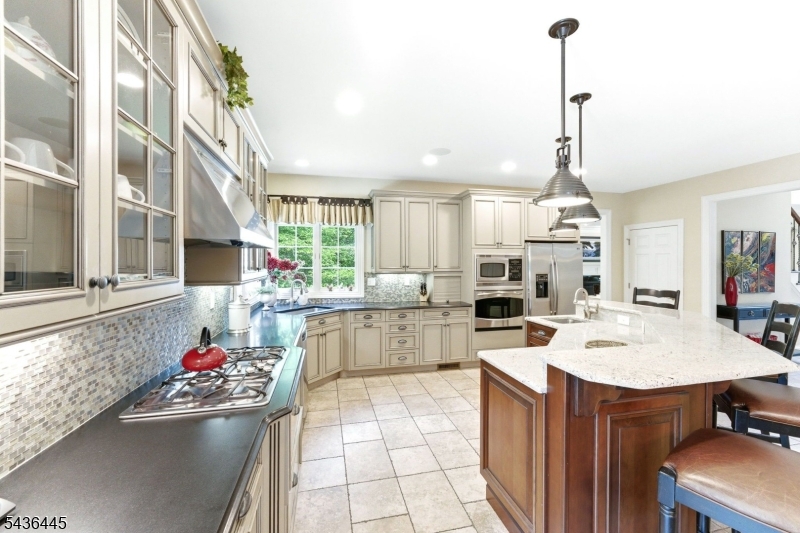 4 Windemere Way Sparta, NJ 07871 - Photo 16 of 50 a kitchen with a sink and stove