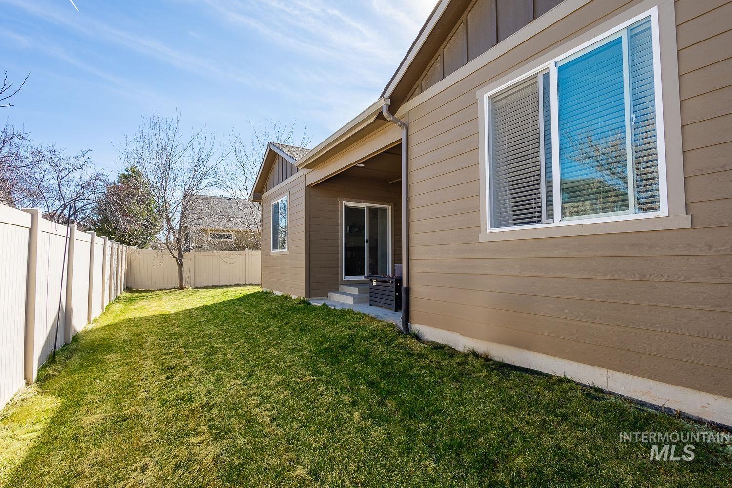 1332 West Raelin Drive Nampa, ID 83686 - Photo 44 of 48 Fenced backyard with a patio