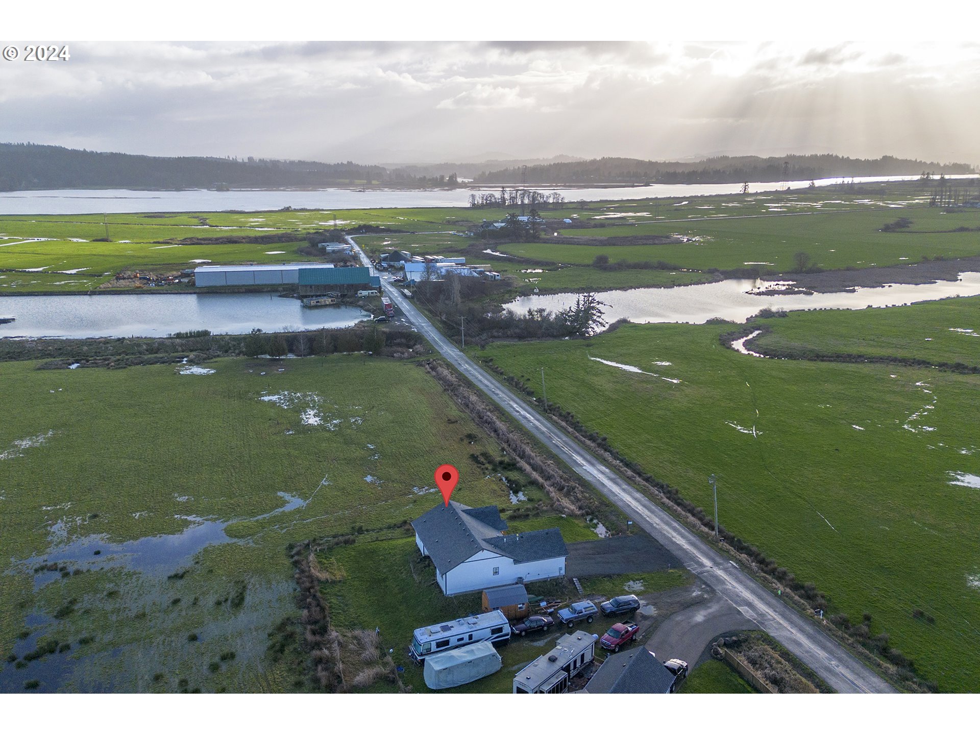 92597 Wireless Road Astoria, OR 97103 - Photo 29 of 35 a view of a lake with a city
