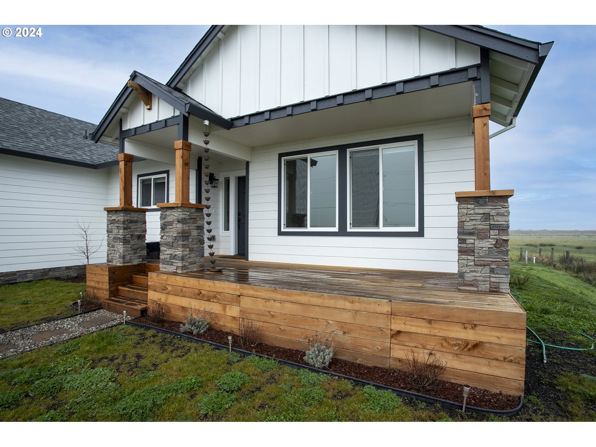 92597 Wireless Road Astoria, OR 97103 - Photo 3 of 35 a front view of a house with a yard