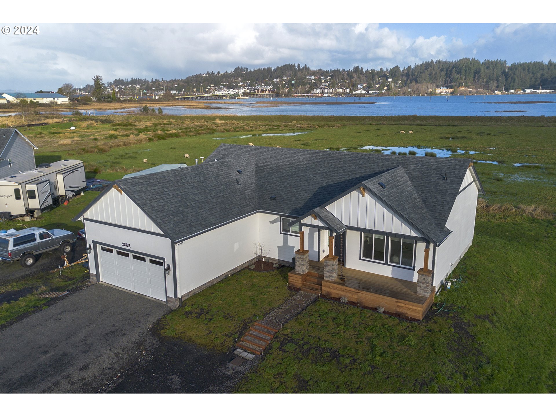 92597 Wireless Road Astoria, OR 97103 - Photo 5 of 35 a view of a terrace with a lake view