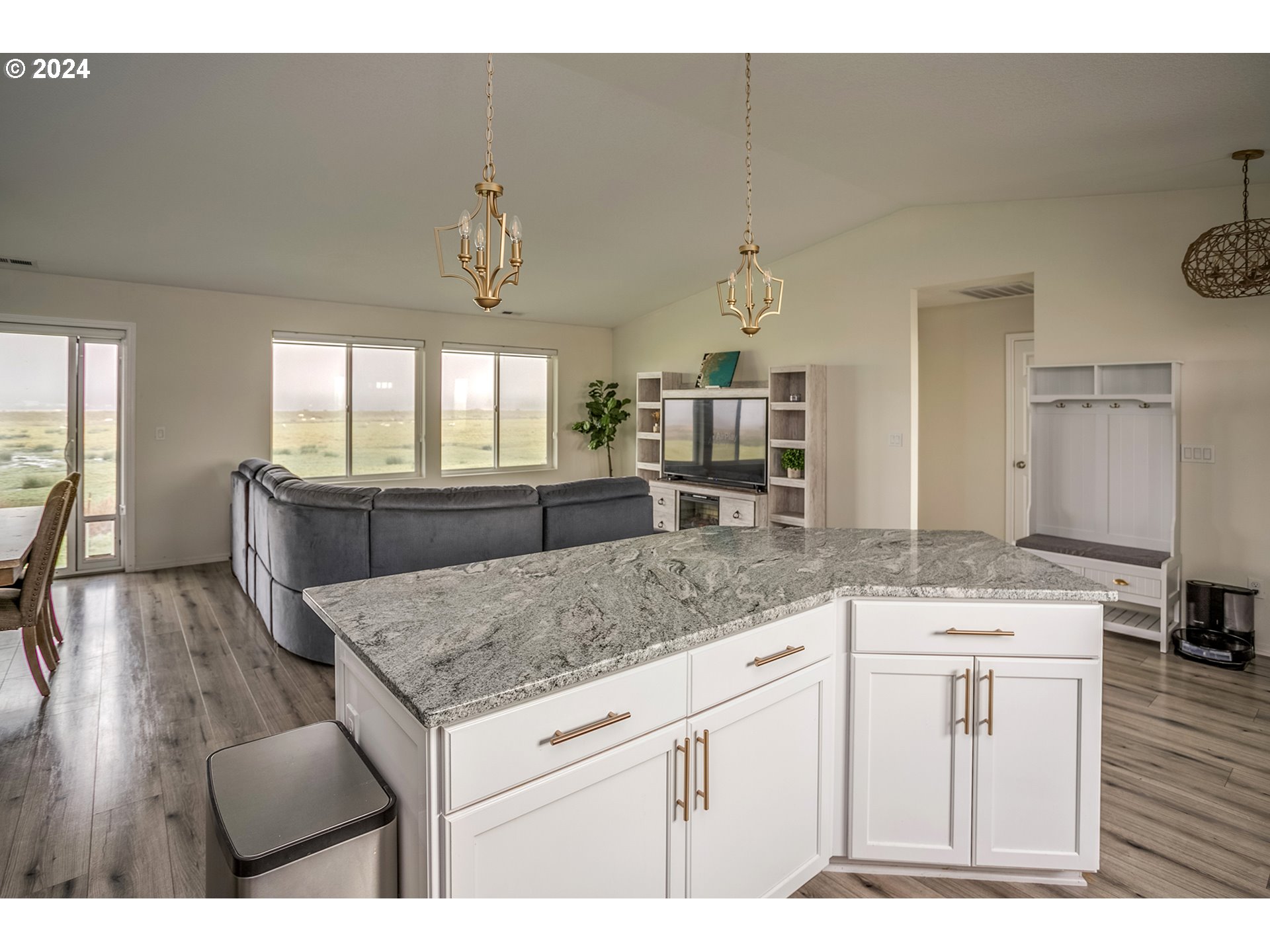92597 Wireless Road Astoria, OR 97103 - Photo 9 of 35 a view of living room with granite countertop furniture and wooden floor