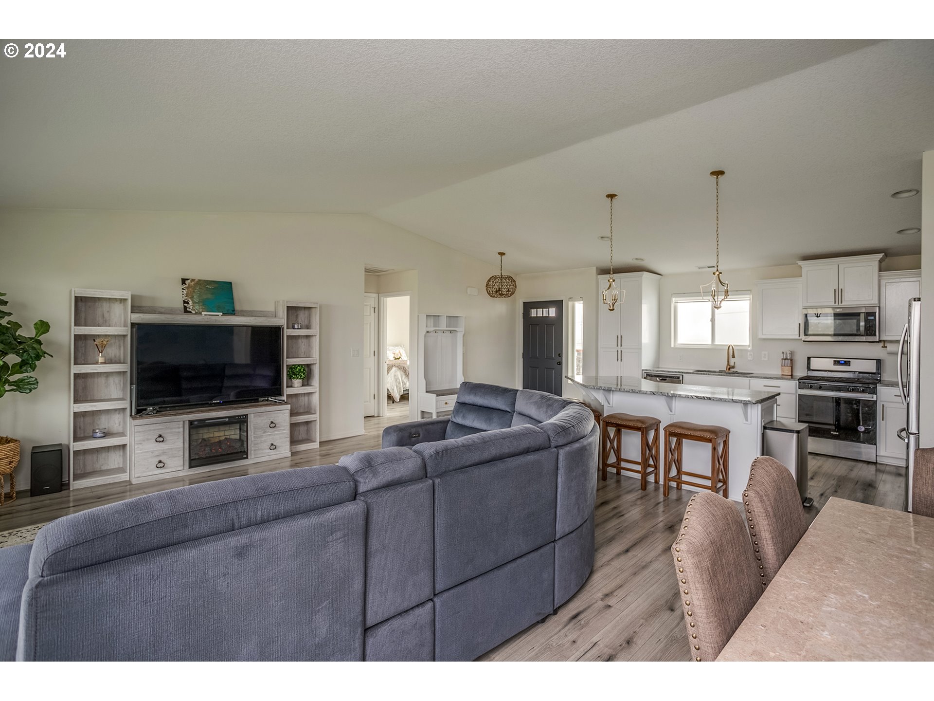 92597 Wireless Road Astoria, OR 97103 - Photo 10 of 35 a living room with furniture and a flat screen tv