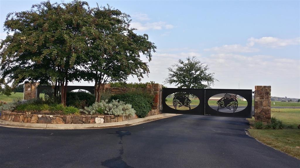 Tbd Shore Crest Way Athens, TX 75752 - Photo 2 of 5 a view of a street with sitting area