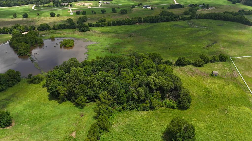 Tbd Shore Crest Way Athens, TX 75752 - Photo 4 of 5 a view of a garden with a lake