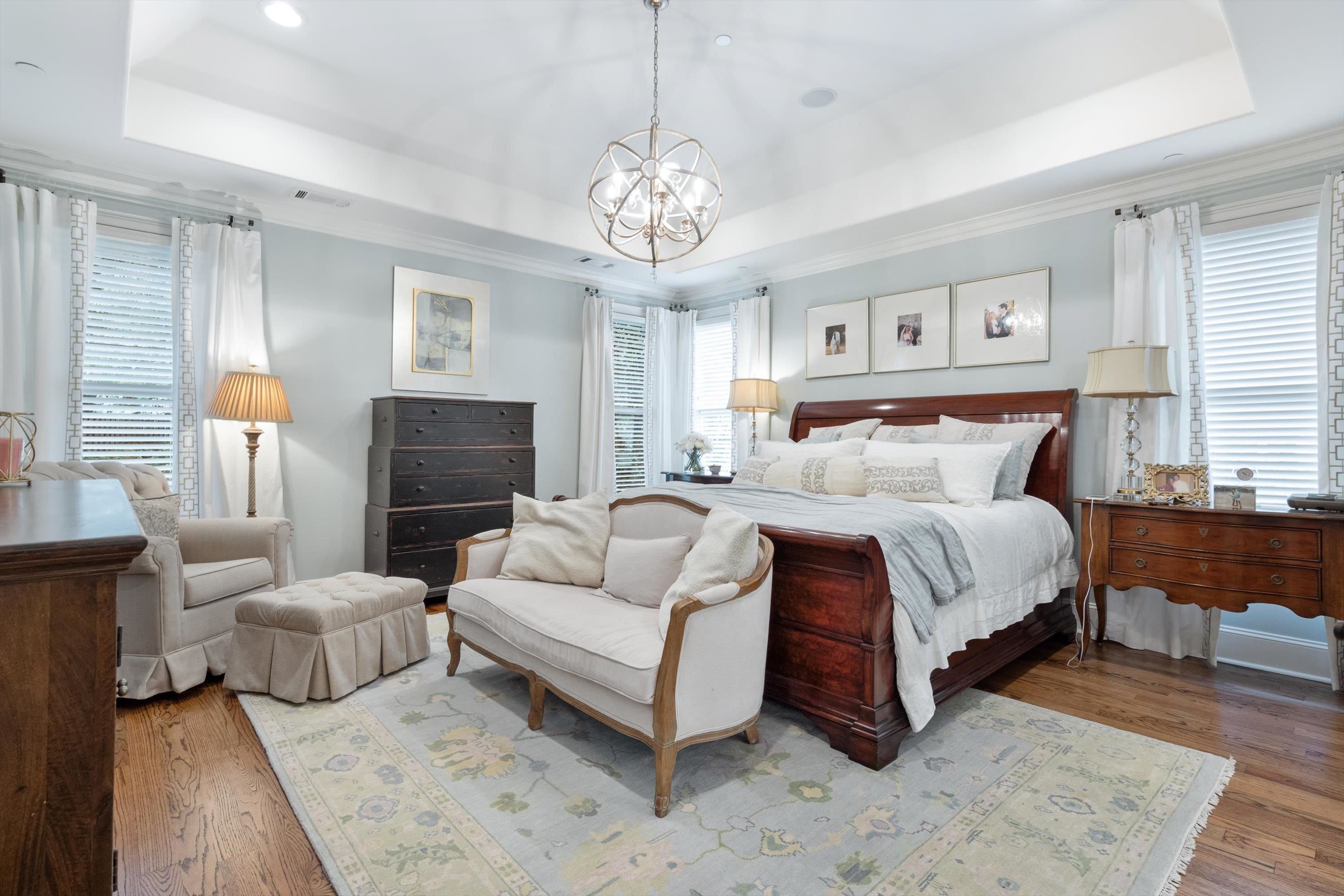 4621 Spring Meadow Way North Olive Branch, MS 38654 - Photo 18 of 40 a spacious bedroom with a bed and a couch