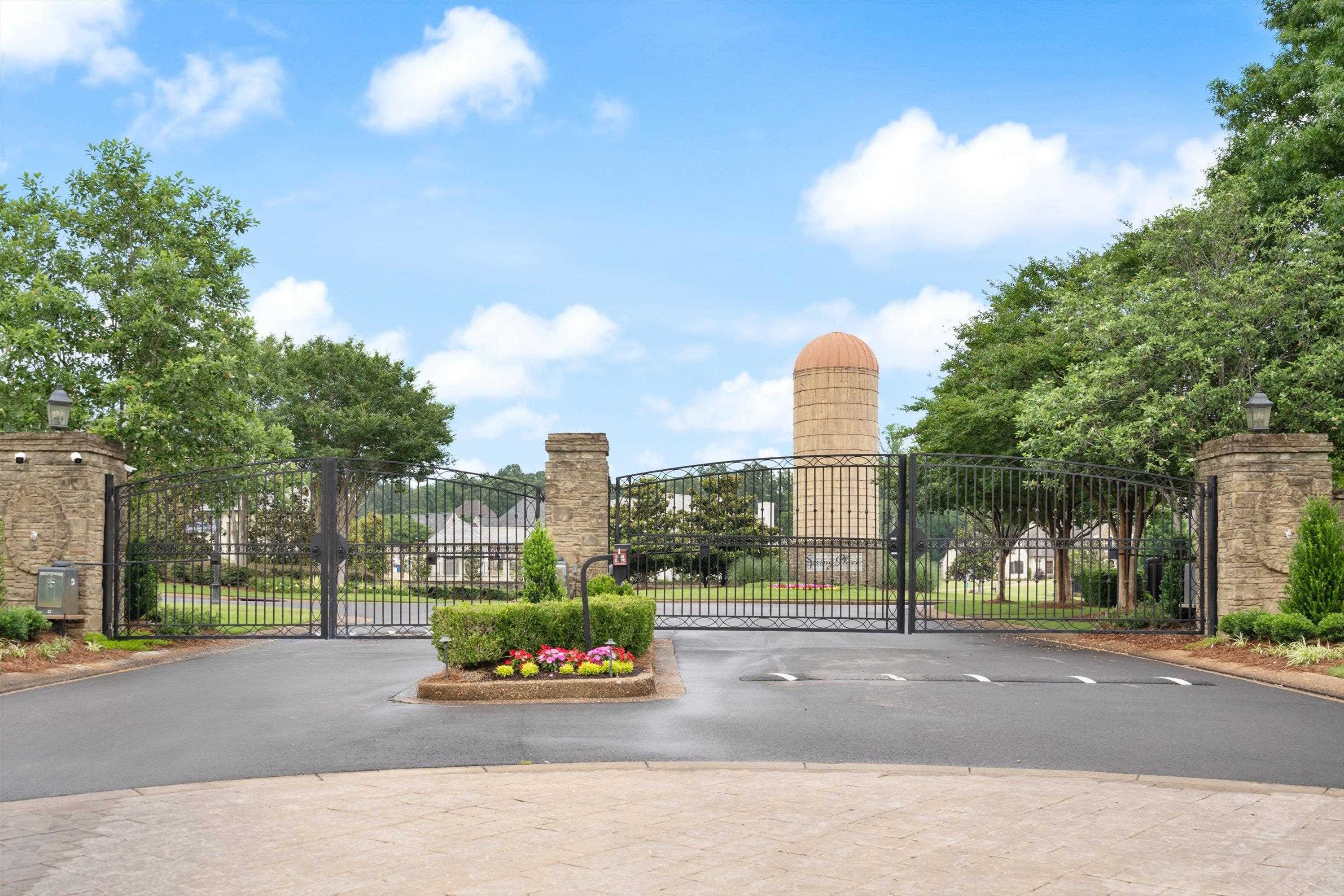 4621 Spring Meadow Way North Olive Branch, MS 38654 - Photo 2 of 40 a front view of a house with a garden and pathway