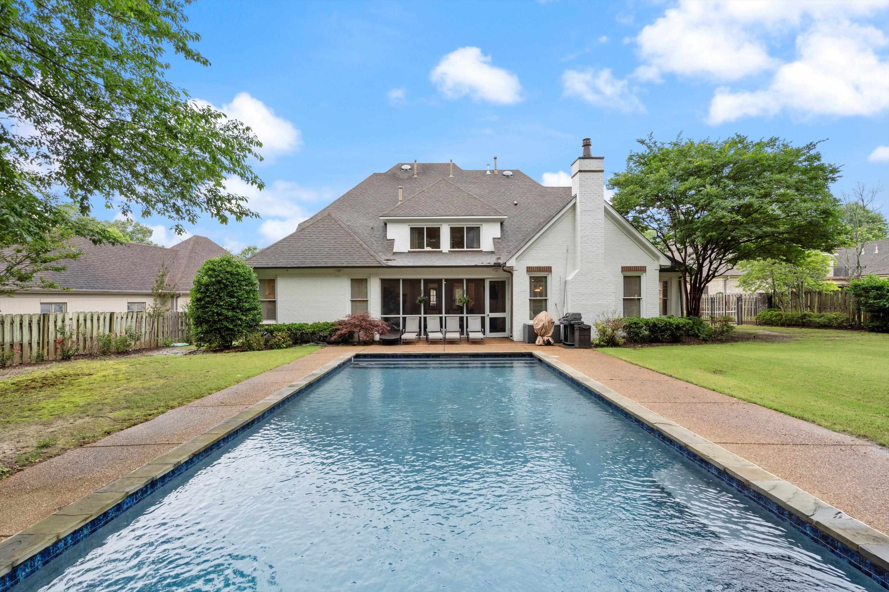 4621 Spring Meadow Way North Olive Branch, MS 38654 - Photo 34 of 40 a front view of a house with a yard