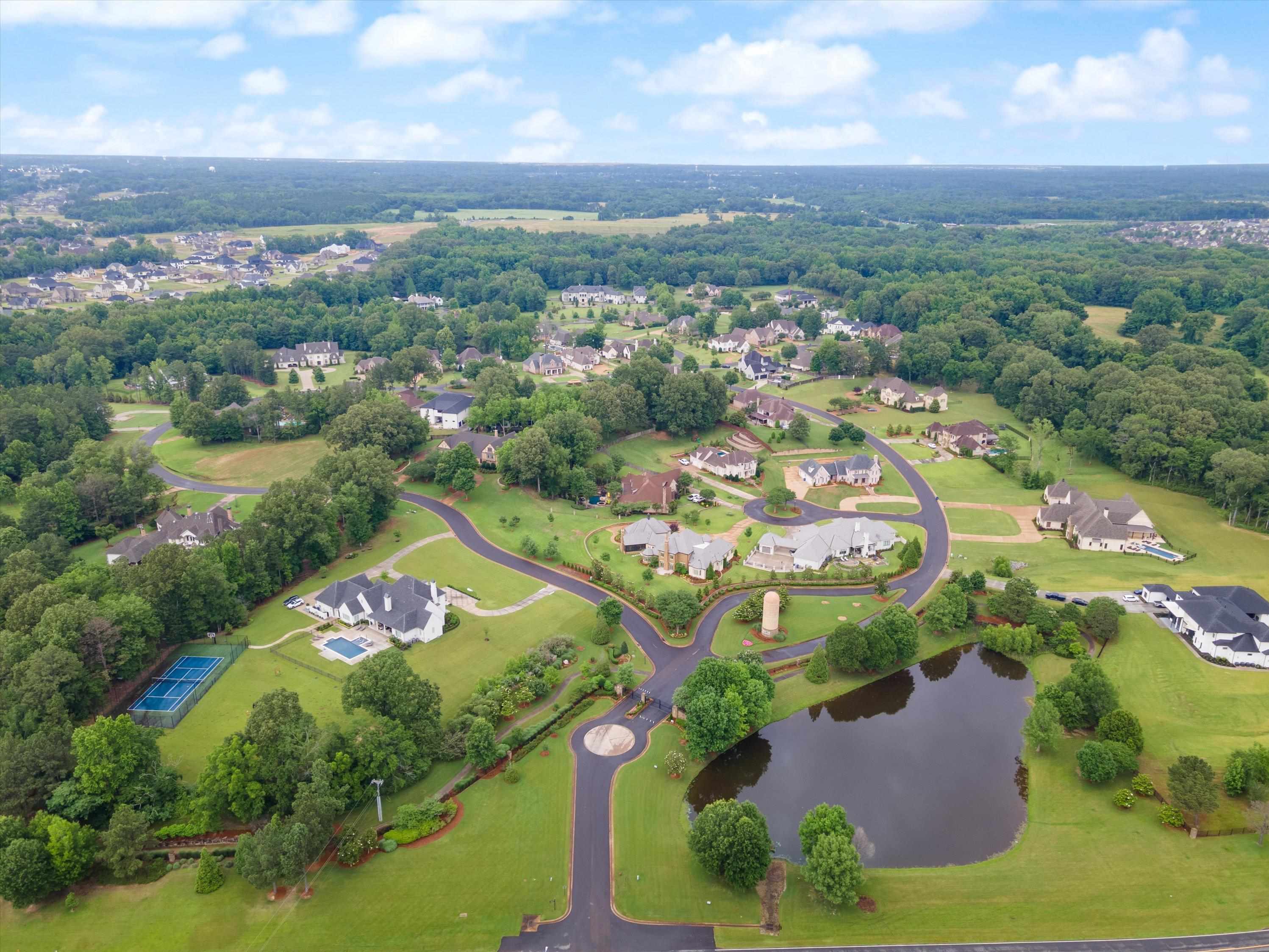 4621 Spring Meadow Way North Olive Branch, MS 38654 - Photo 38 of 40 an aerial view of a residential houses with outdoor space and trees