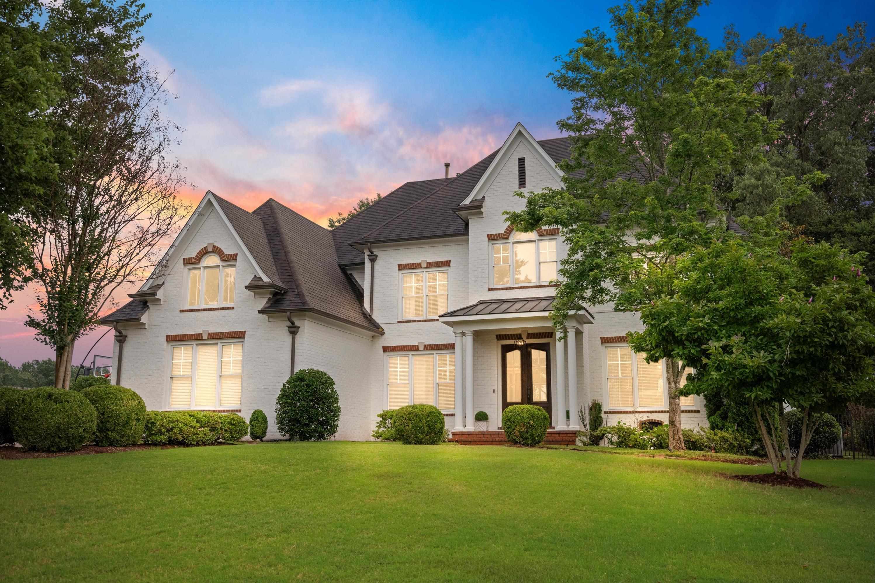 4621 Spring Meadow Way North Olive Branch, MS 38654 - Photo 39 of 40 a front view of a house with a garden