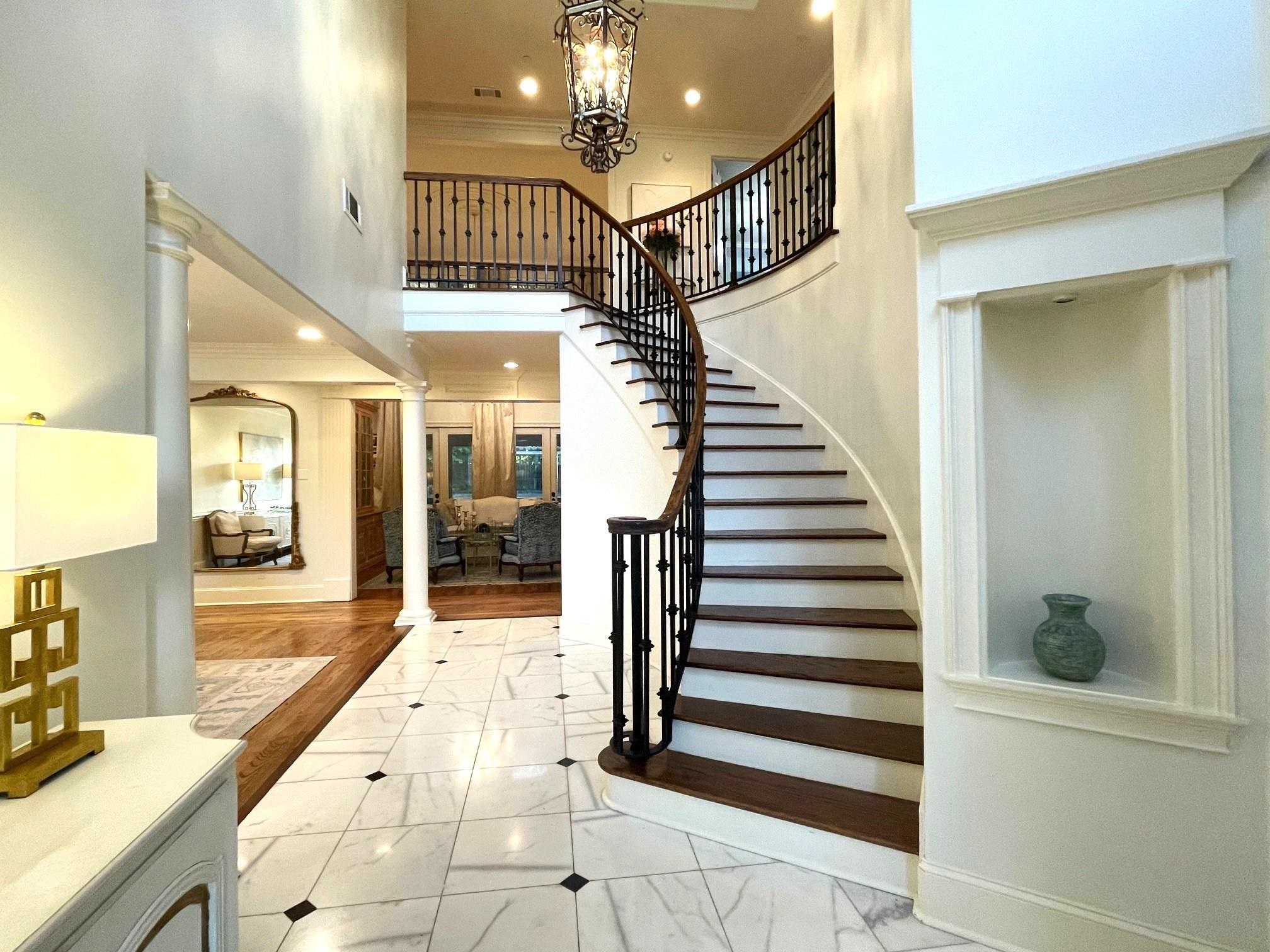 4621 Spring Meadow Way North Olive Branch, MS 38654 - Photo 5 of 40 a view of entryway and hall with wooden floor