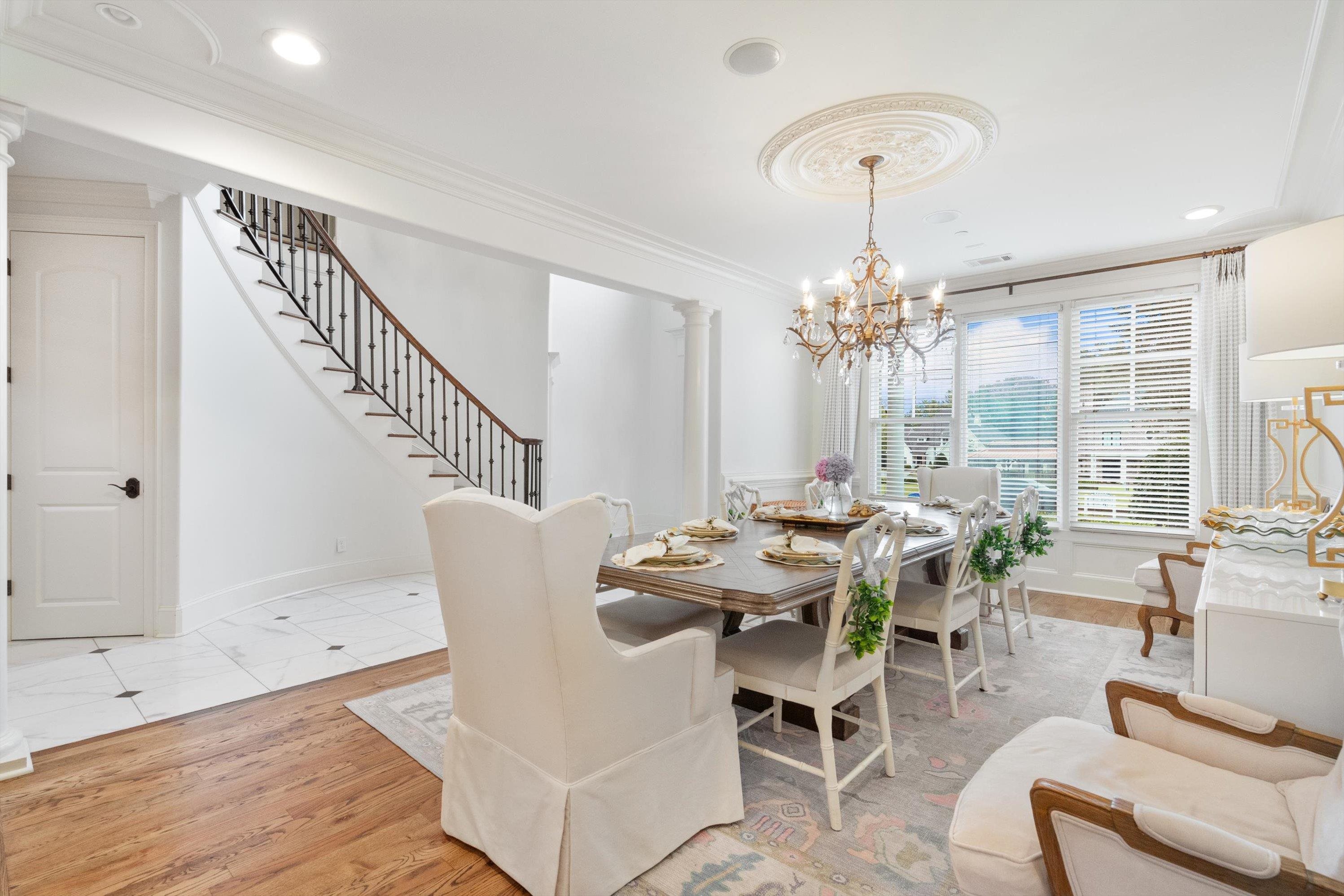 4621 Spring Meadow Way North Olive Branch, MS 38654 - Photo 6 of 40 a view of a dining room with furniture window and wooden floor