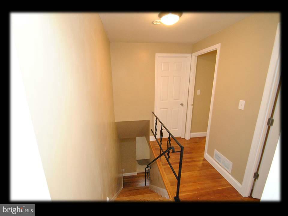 8 Bladen Road Baltimore, MD 21221 - Photo 16 of 26 GLEAMING NATURAL HARDWOOD FLOORS