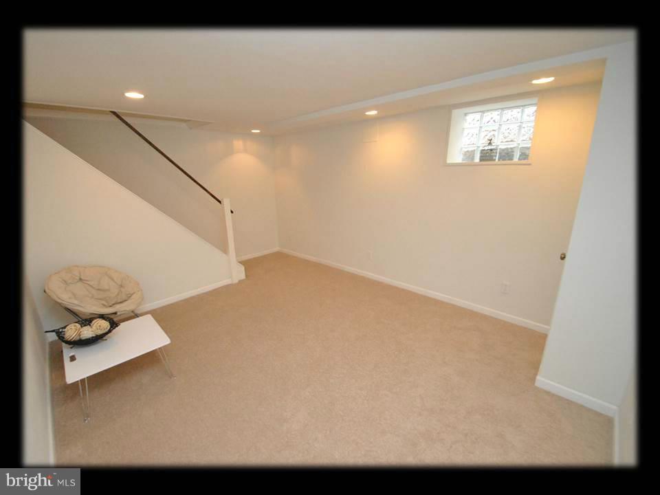 8 Bladen Road Baltimore, MD 21221 - Photo 21 of 26 FULLY FINISHED BASEMENT
