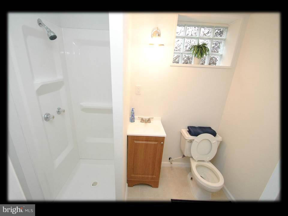 8 Bladen Road Baltimore, MD 21221 - Photo 24 of 26 FULL FINISHED BATH IN BASEMENT