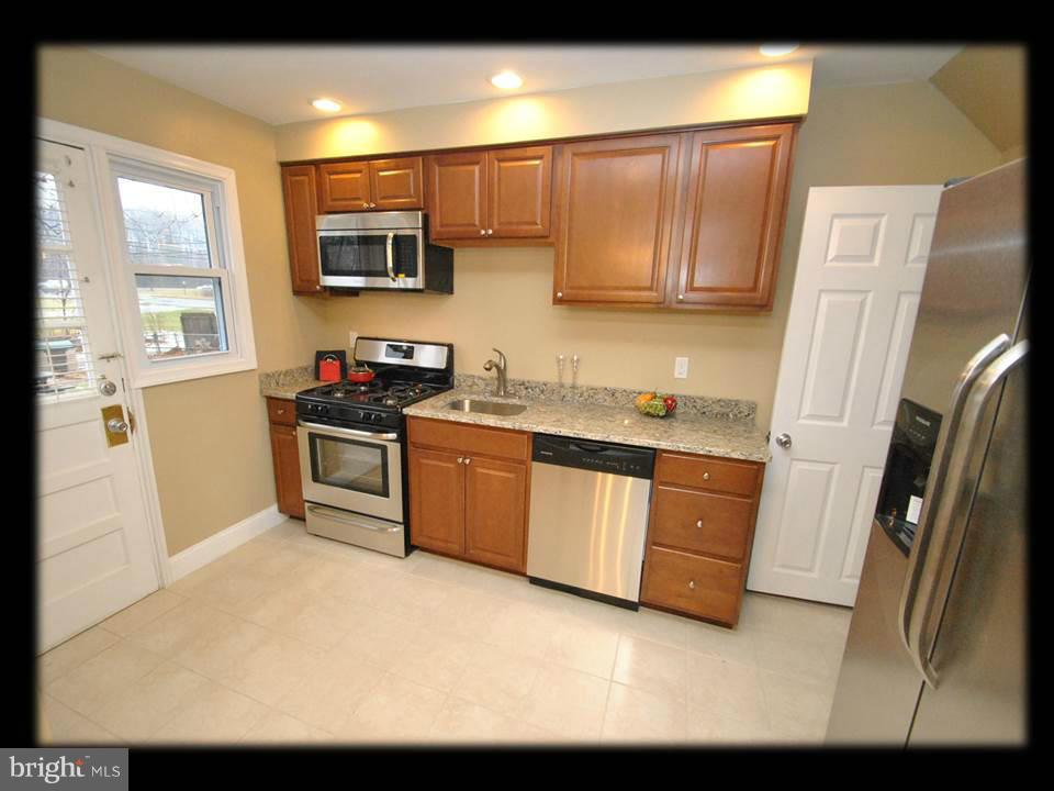 8 Bladen Road Baltimore, MD 21221 - Photo 6 of 26 BRAND NEW CABINETS,GRANITE COUNTERS,STAINLESS APPS