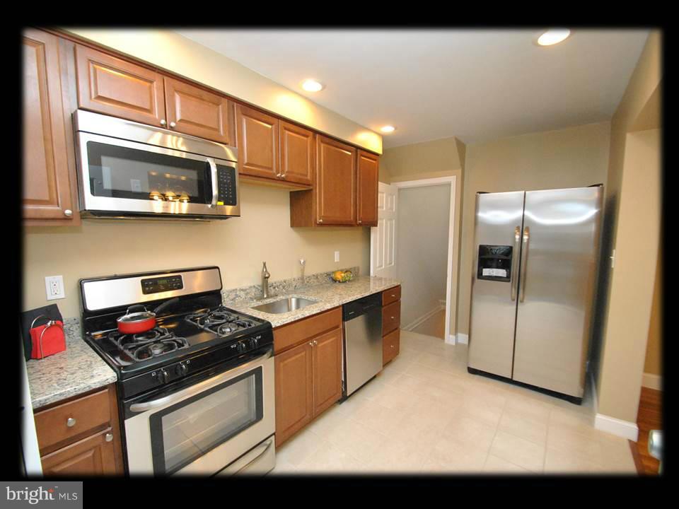 8 Bladen Road Baltimore, MD 21221 - Photo 7 of 26 BRAND NEW CABINETS,GRANITE COUNTERS,STAINLESS APPS