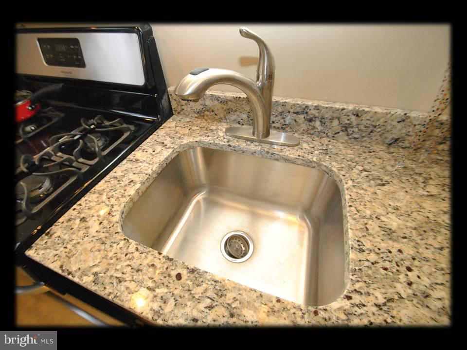 8 Bladen Road Baltimore, MD 21221 - Photo 8 of 26 GRANITE COUNTERS W/UNDERMOUNT SINK & CUSTOM FAUCET