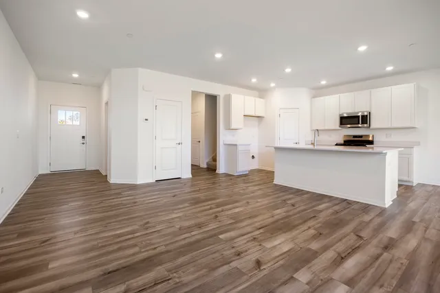 a view of kitchen with wooden floor