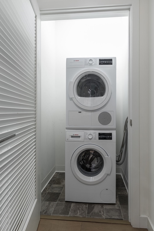 45 Lewis Street, Unit U403 Boston, MA 02128 - Photo 8 of 20 a utility room with dryer and washer