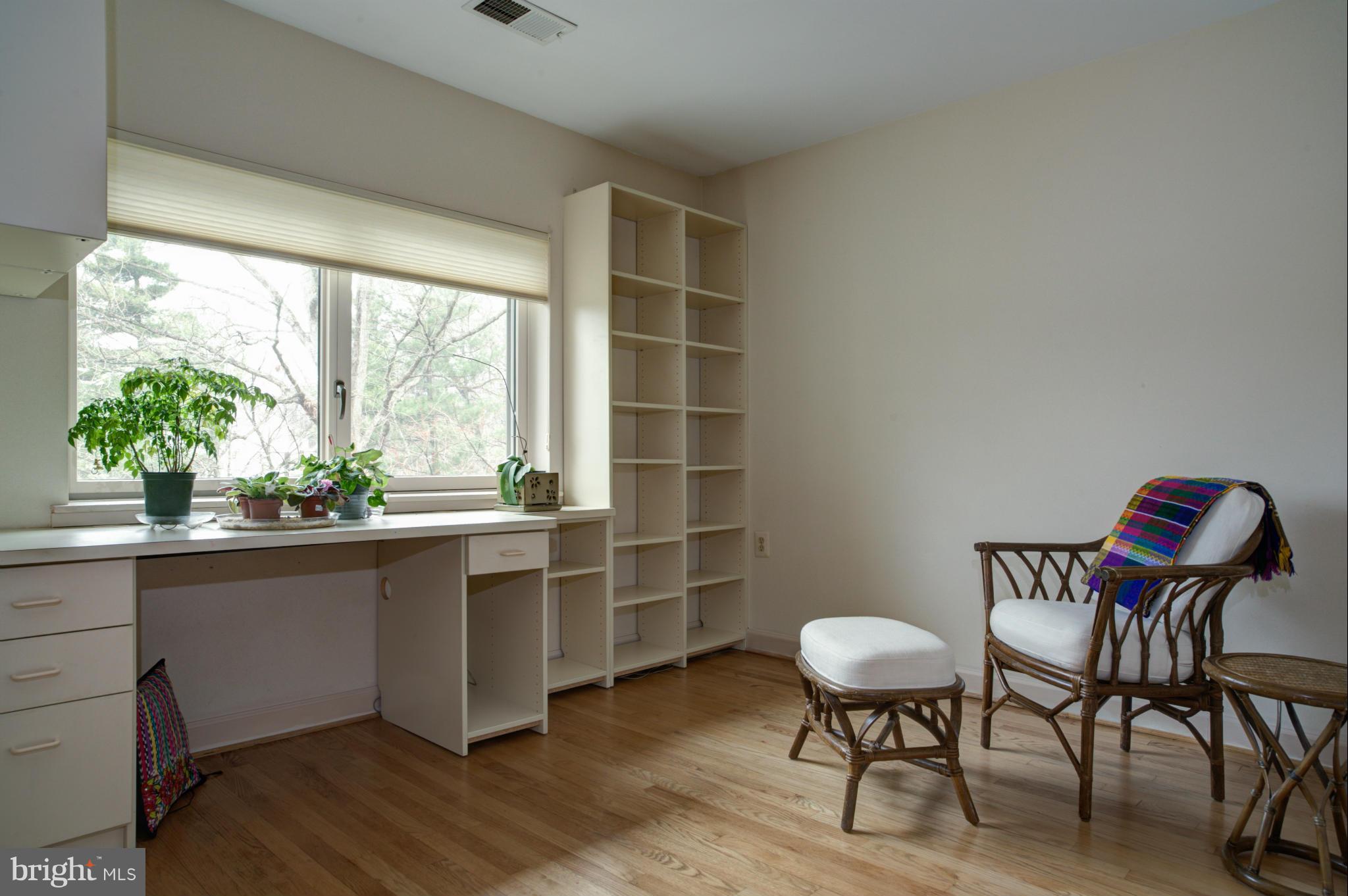 1617 Inlet Court Reston, VA 20190 - Photo 14 of 24 Bedroom 2 with built-in desk & shelving