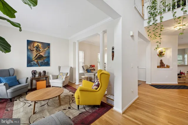 a living room with furniture and a table