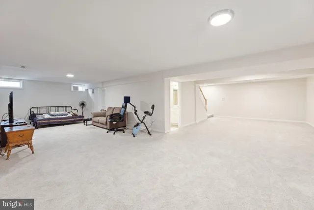 a view of a livingroom with furniture and a couch